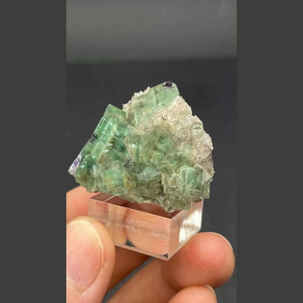 Glassy transparent green fluorite cluster from Hebei — alternate view