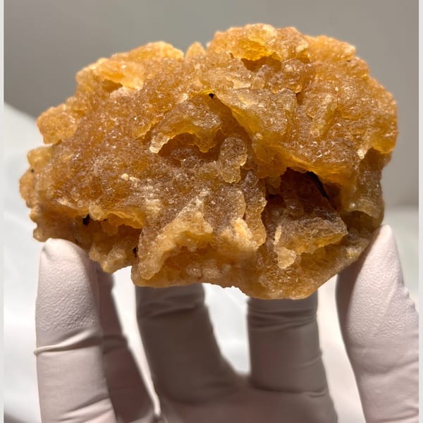 Yellow fluorite with cut base — detail view