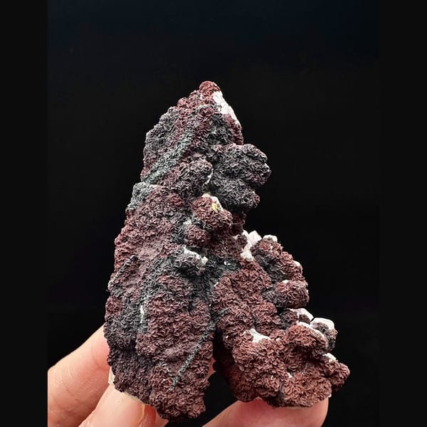 Second-growth amethyst with red limonite from Inner Mongolia — alternate view