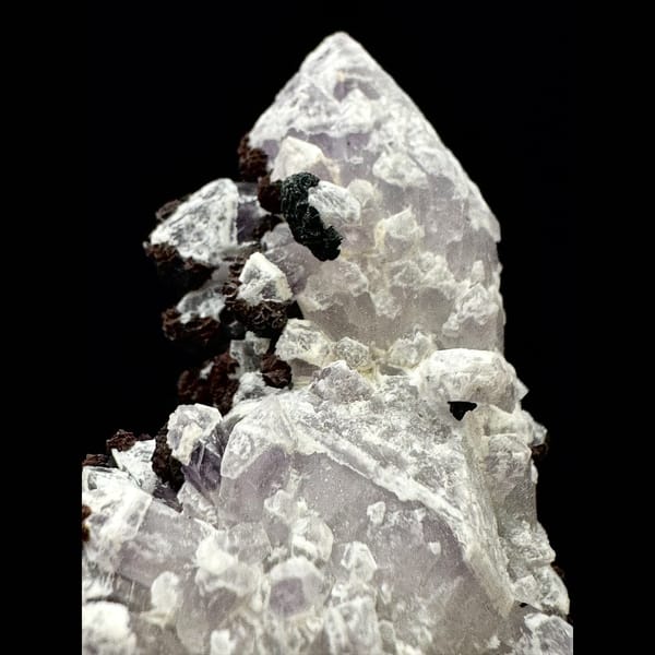 Second-growth amethyst with red limonite from Inner Mongolia — detail view