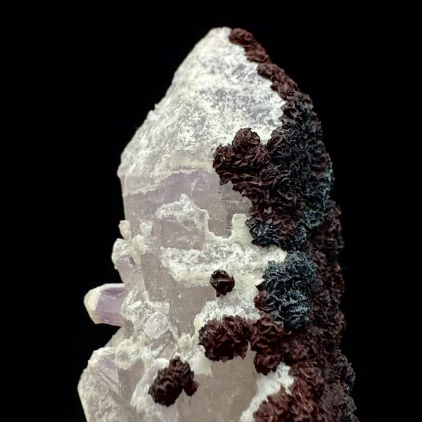 Second-growth amethyst with red limonite from Inner Mongolia — detail view