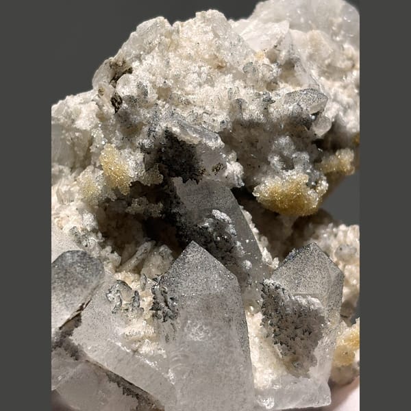 Quartz with apophyllite and goethite from Hubei — detail view