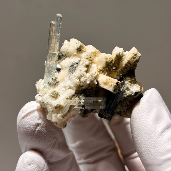 Aquamarine with tourmaline and feldspar from Pakistan — alternate view