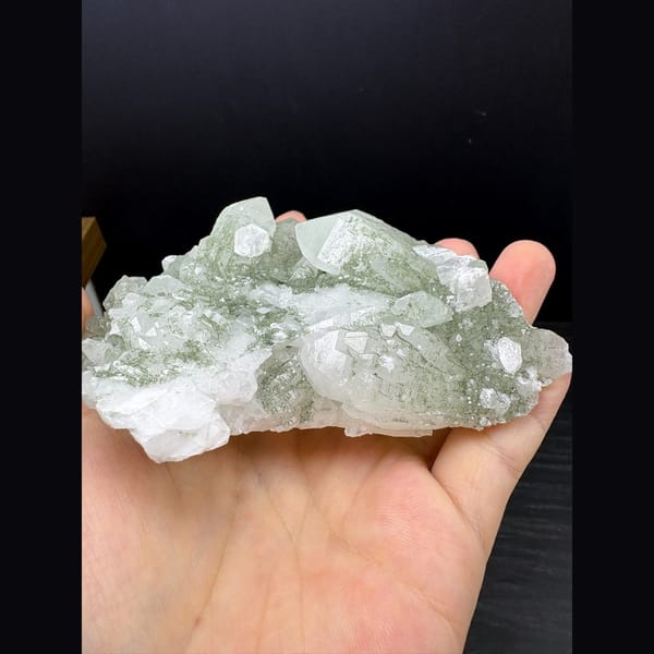 Large quartz cluster coated green by chlorite — complete view