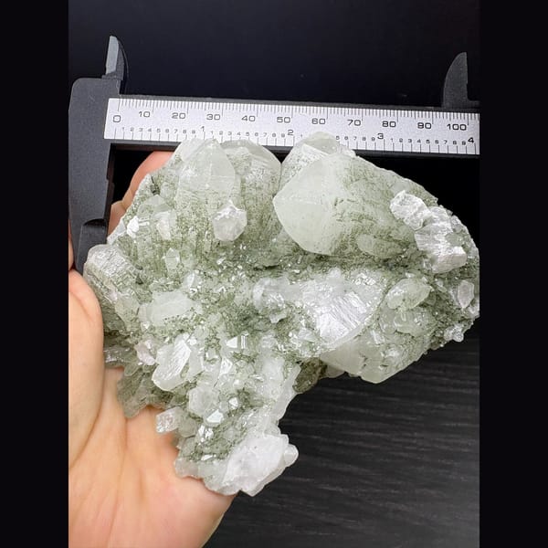Large quartz cluster coated green by chlorite — alternate view