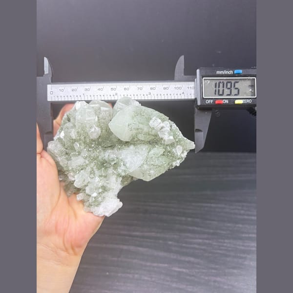 Large quartz cluster coated green by chlorite — alternate view