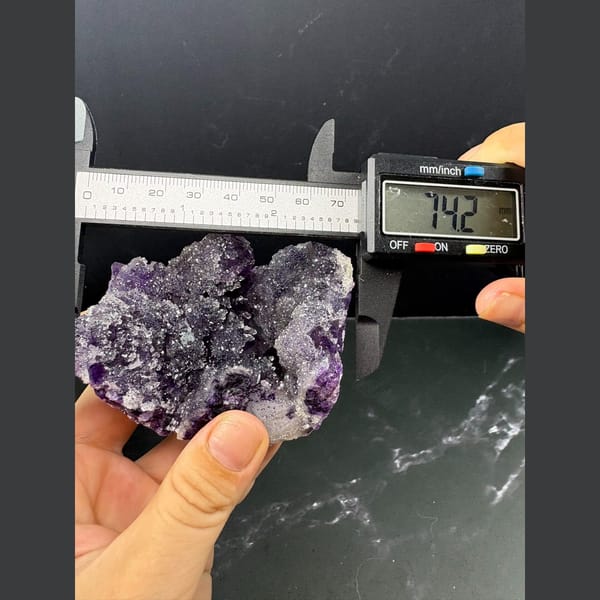 Purple fluorite cluster with a sparkling sugary surface — alternate view