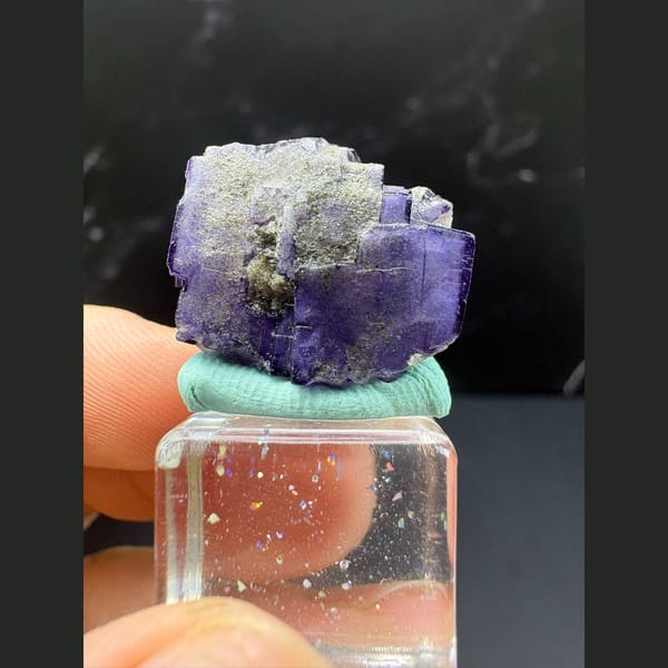Small rich purple fluorite crystal from Yaogangxian — alternate view