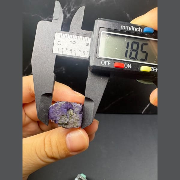 Small rich purple fluorite crystal from Yaogangxian — detail view