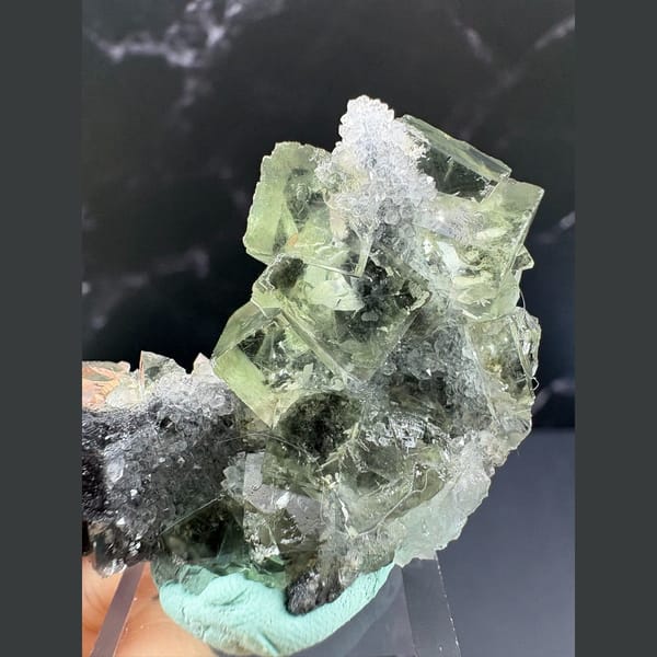 Glassy green octahedral fluorite with quartz from Fujian — alternate view