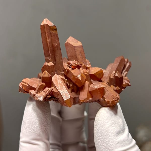 Red quartz crystal specimen — complete view