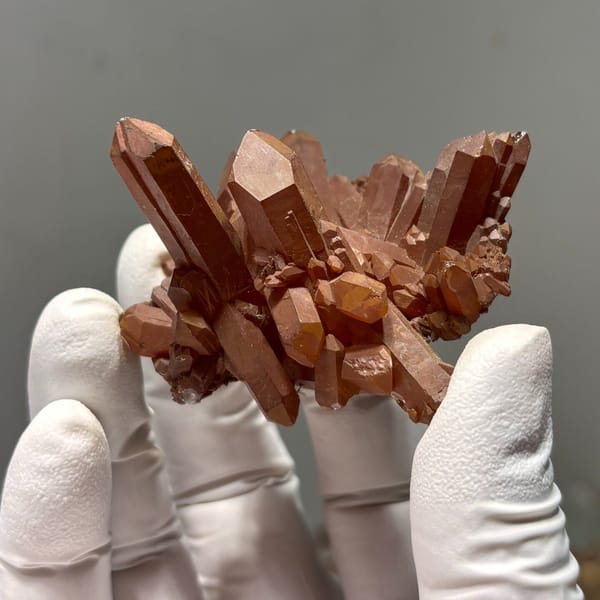 Red quartz crystal specimen — alternate view