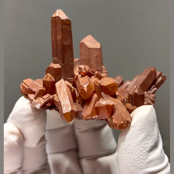 Red quartz crystal specimen — alternate view