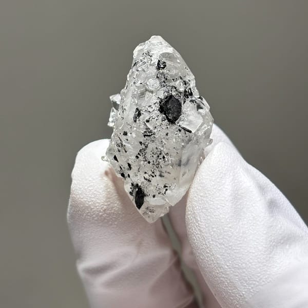 Freestanding calcite with quartz from Yunnan — detail view