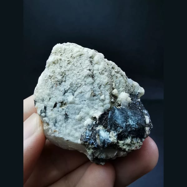 Specular hematite balls with large calcite crystals — alternate view