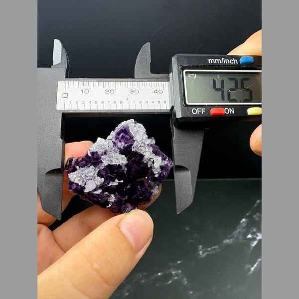 Deep purple fluorite cubes with white quartz from Luoyang — detail view