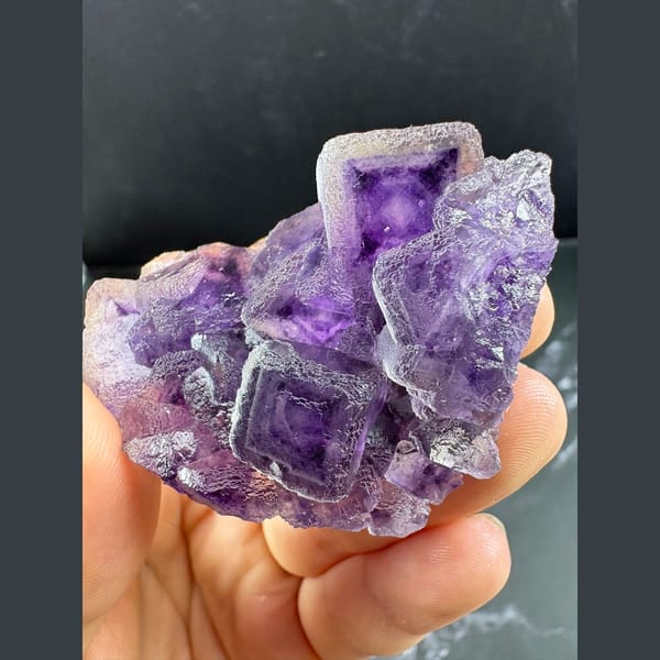 Lavender fluorite cubes with purple inner phantoms from Henan — complete view