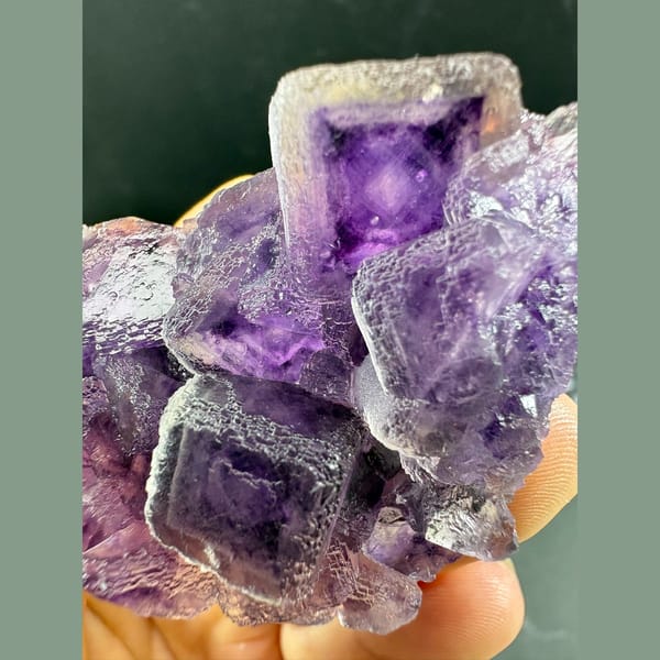Lavender fluorite cubes with purple inner phantoms from Henan — detail view