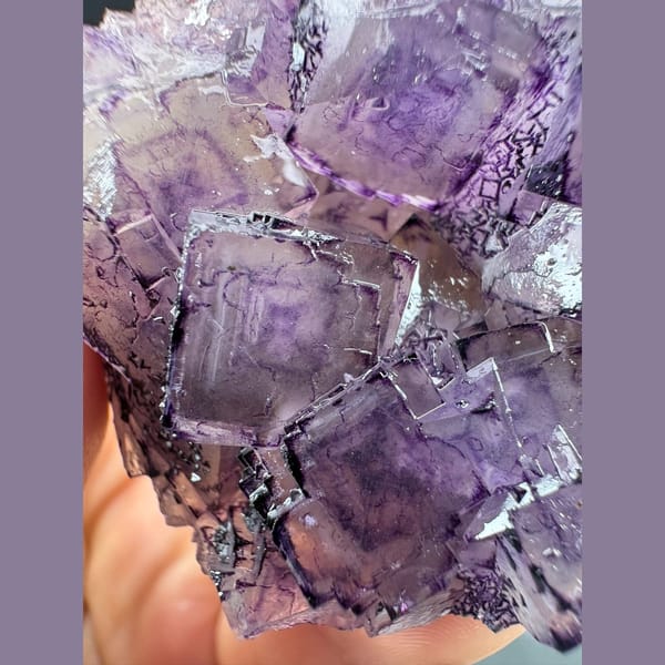 Purple fluorite cluster with patterned inner zoning from Luoyang — complete view