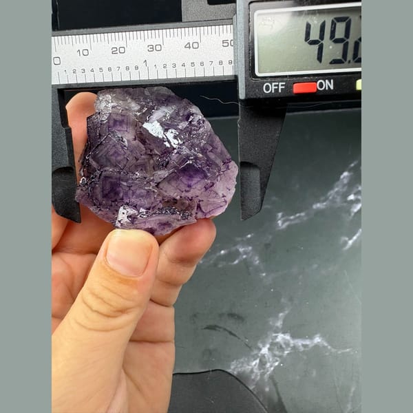 Purple fluorite cluster with patterned inner zoning from Luoyang — detail view