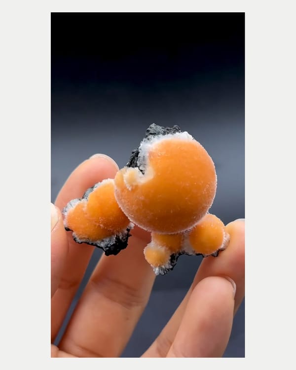 Complete right oblique view of golden spherical zeolite cluster