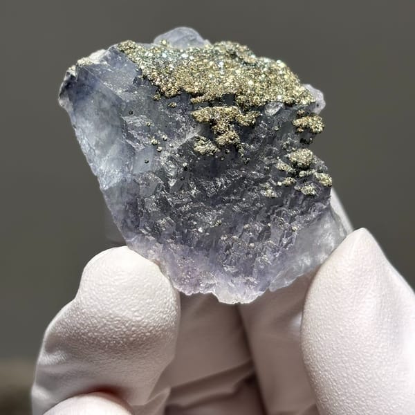 Stepped Yaogangxian fluorite with pyrite — detail view
