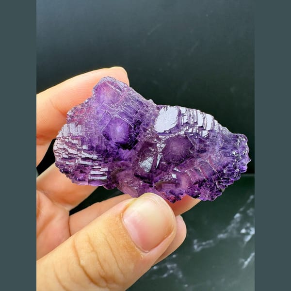 Stepped cluster of deep purple fluorite cubes from Henan — alternate view