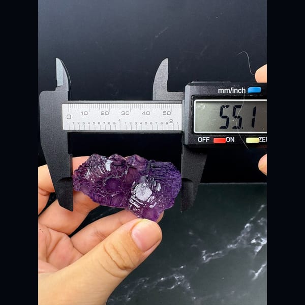Stepped cluster of deep purple fluorite cubes from Henan — detail view