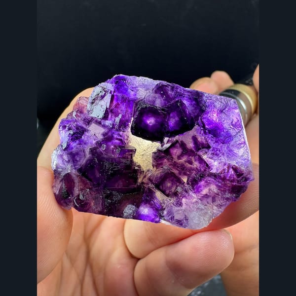 Glassy deep purple fluorite crystal group from Henan — alternate view