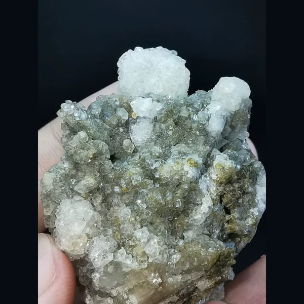 Small garnets and calcite coated by apophyllite — alternate view