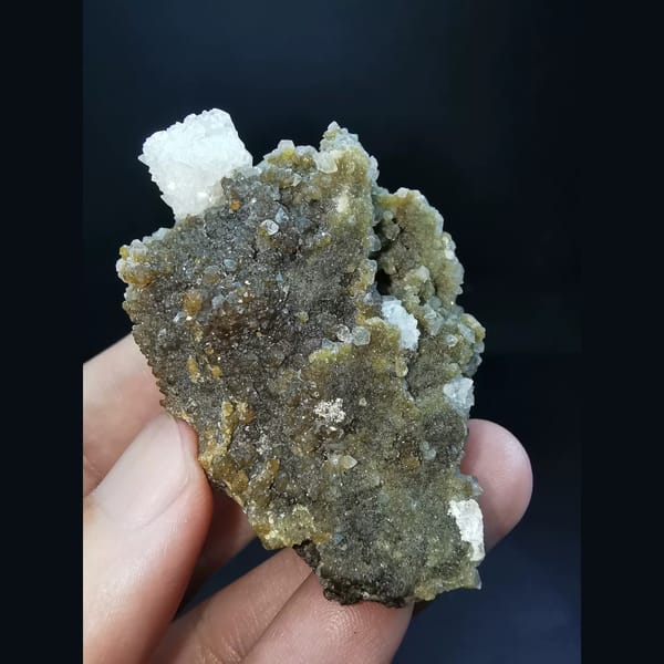 Small garnets and calcite coated by apophyllite — alternate view