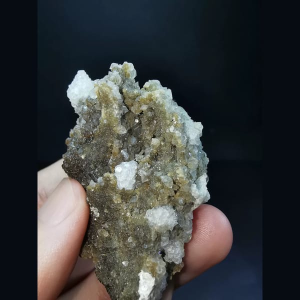 Small garnets and calcite coated by apophyllite — detail view