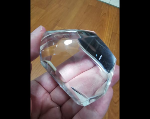Complete front view of the exact polished clear quartz freeform