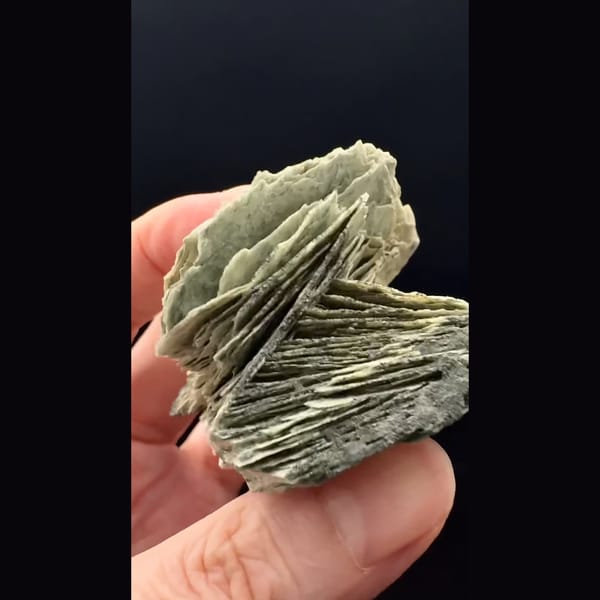 Layered grey-green bladed calcite from Inner Mongolia — complete view