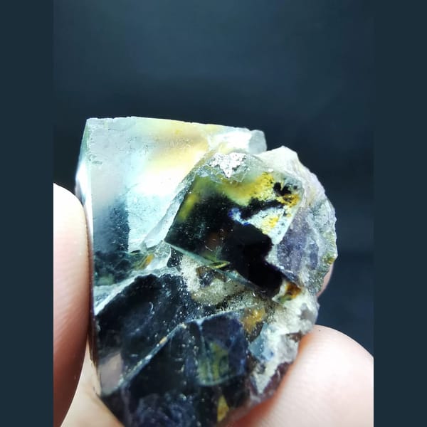 Ice-clear fluorite with pyrite — complete view