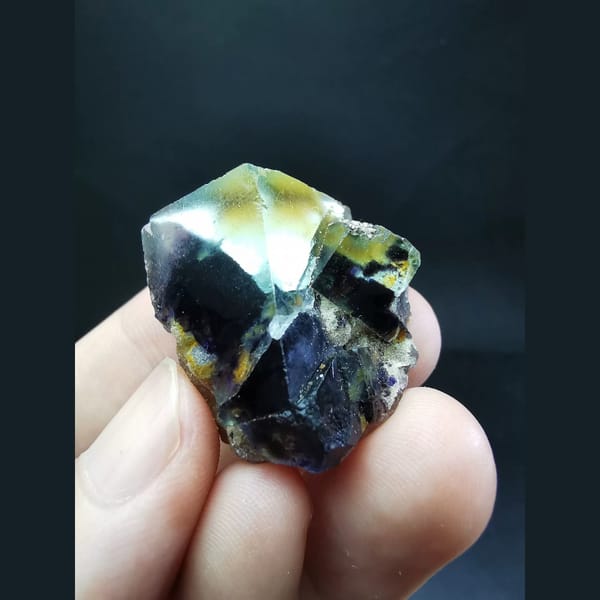Ice-clear fluorite with pyrite — detail view