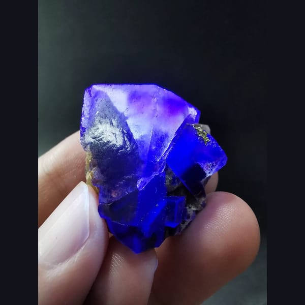 Ice-clear fluorite with pyrite — detail view