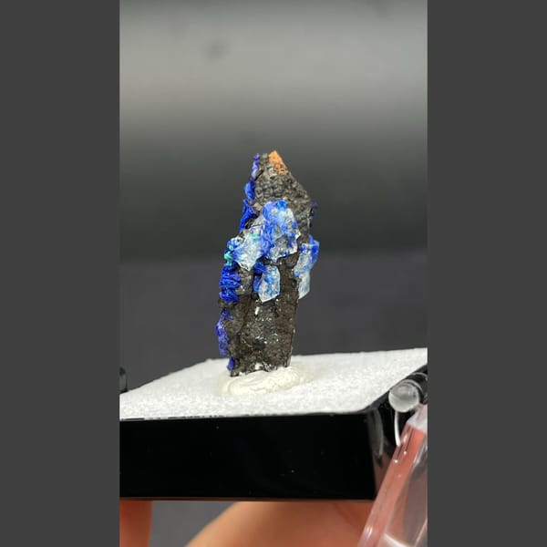 Deep blue azurite with malachite on limonite-coated quartz from Morocco — alternate view
