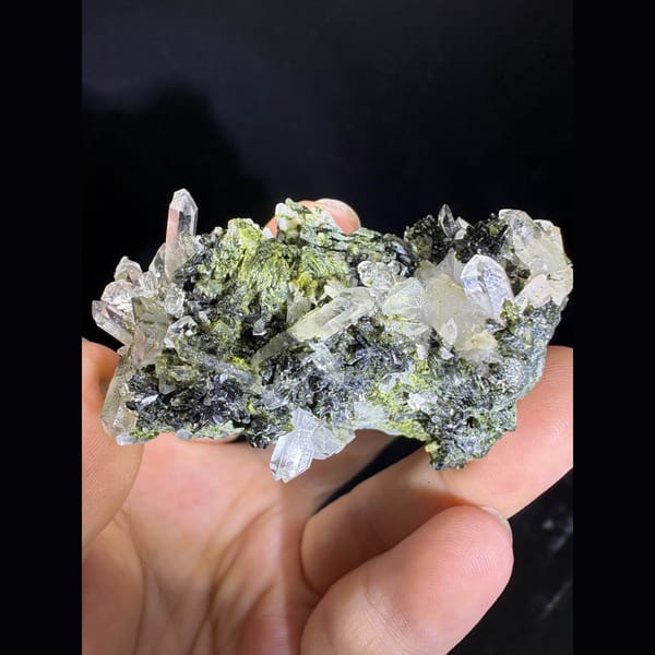 Clear quartz points with dark green epidote — alternate view