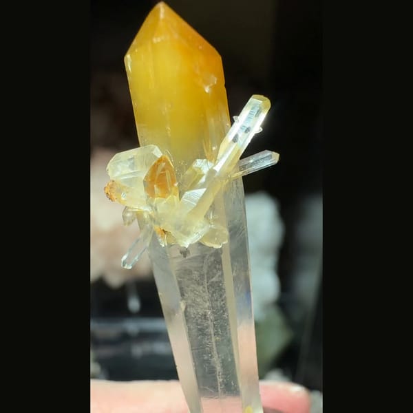 Slender mango-tipped quartz with small sprouts from Colombia — detail view
