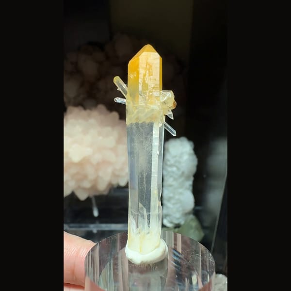 Slender mango-tipped quartz with small sprouts from Colombia — detail view