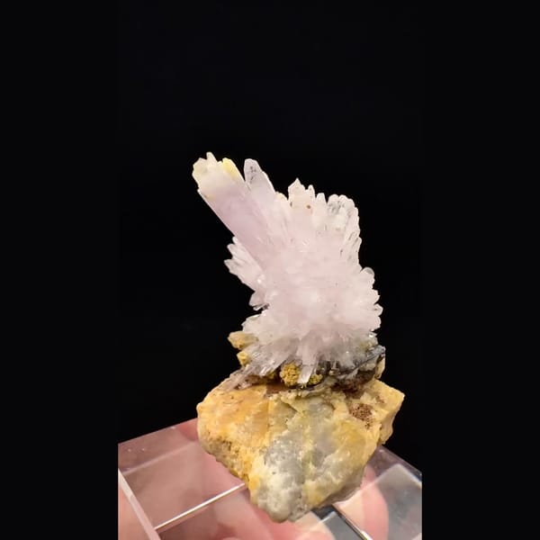 Lilac-white creedite spray on matrix from Guizhou — detail view