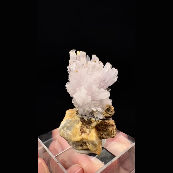 Lilac-white creedite spray on matrix from Guizhou — detail view