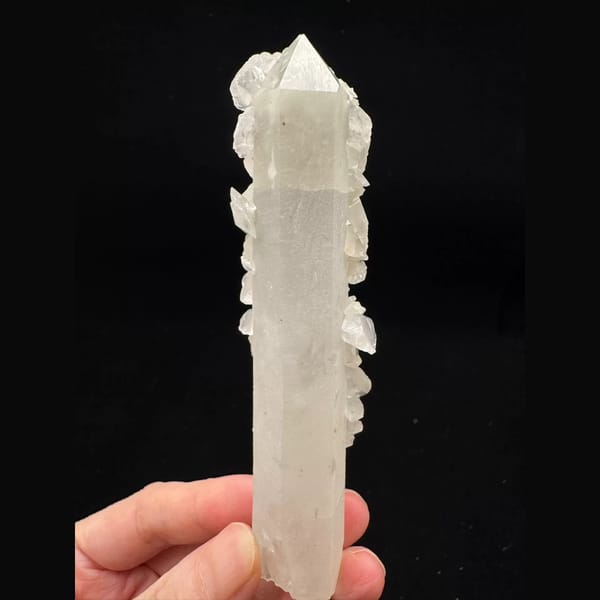 Tall quartz crystal with white bud and petal calcite from Inner Mongolia — alternate view