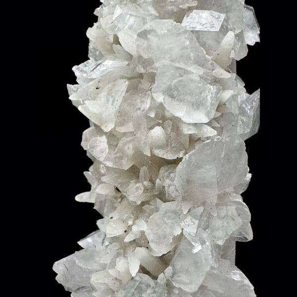 Tall quartz crystal with white bud and petal calcite from Inner Mongolia — alternate view
