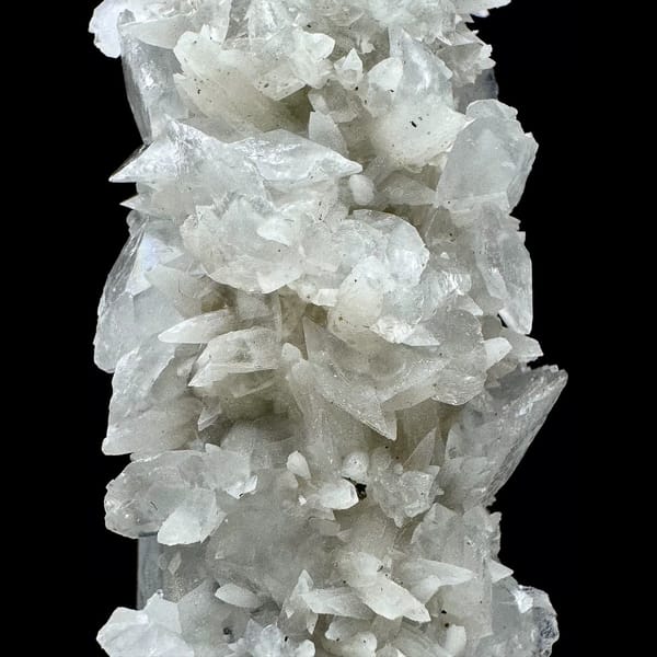 Tall quartz crystal with white bud and petal calcite from Inner Mongolia — detail view
