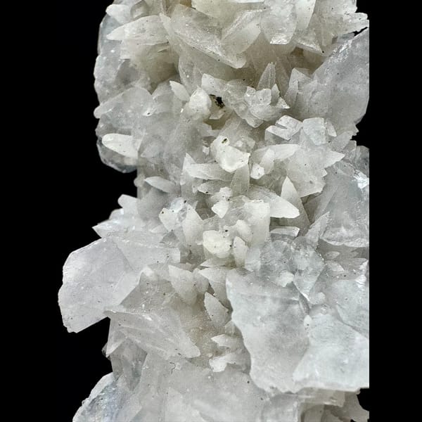 Tall quartz crystal with white bud and petal calcite from Inner Mongolia — detail view