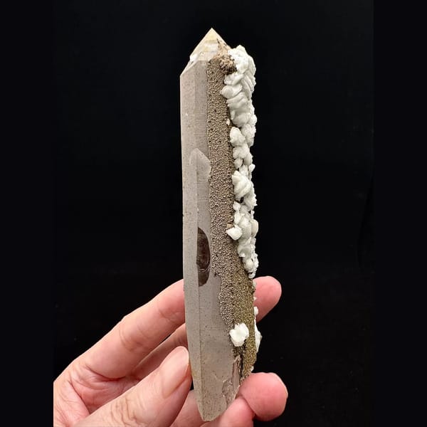Slender quartz crystal with white petal calcite from Inner Mongolia — alternate view