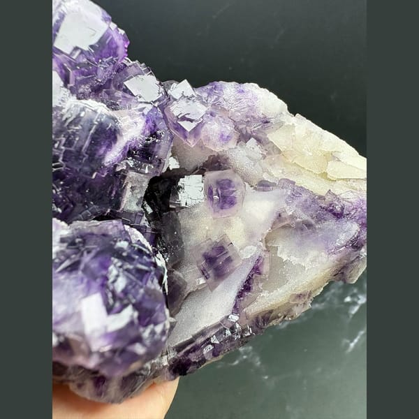 Large deep purple fluorite cluster with white quartz from Henan — detail view
