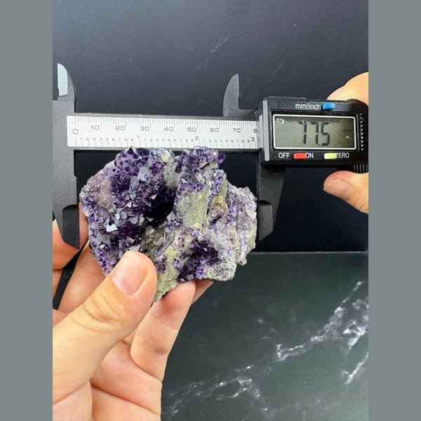 Purple fluorite with pale-windowed faces and candle quartz from Luoyang — detail view